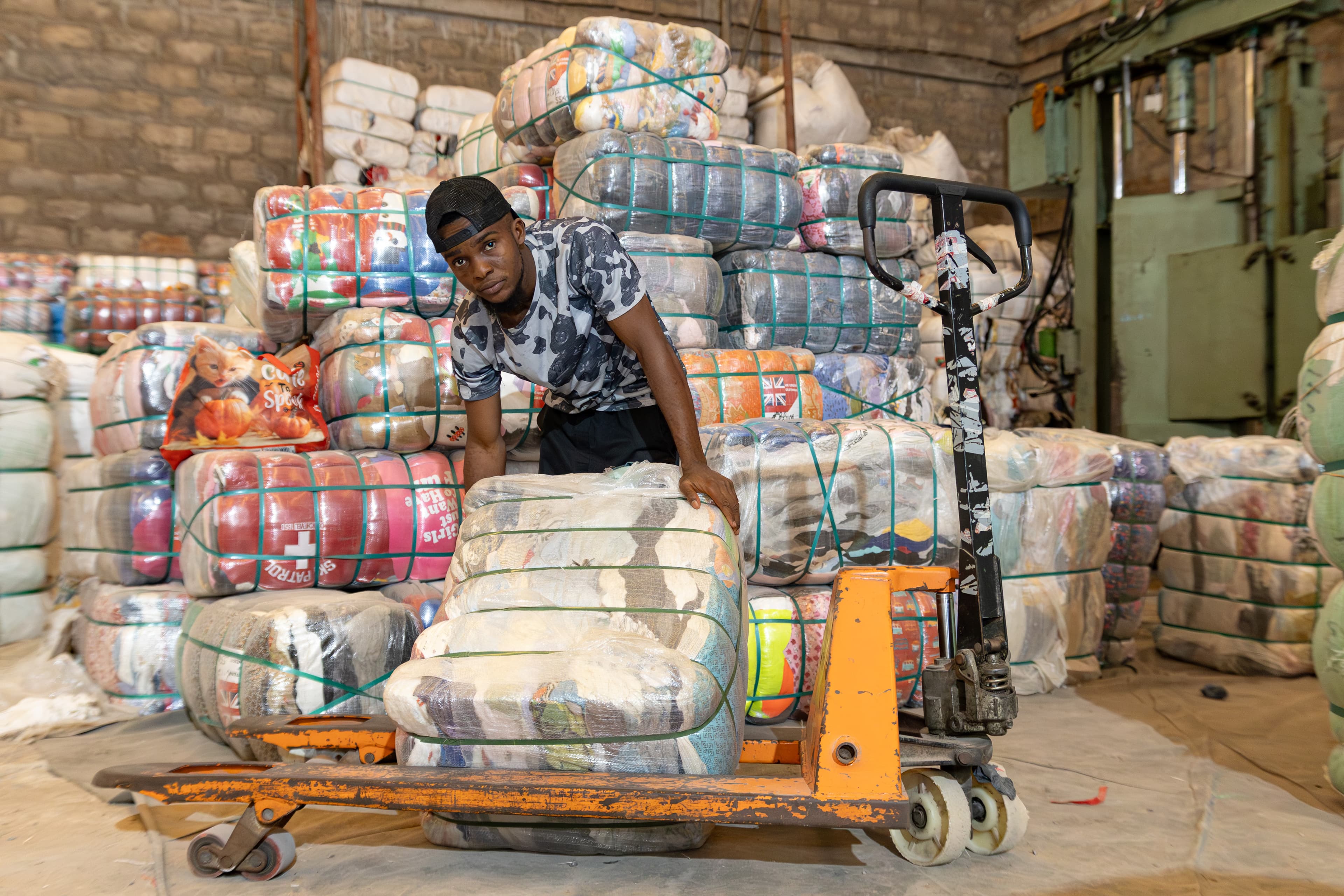 Worker with pallet jack